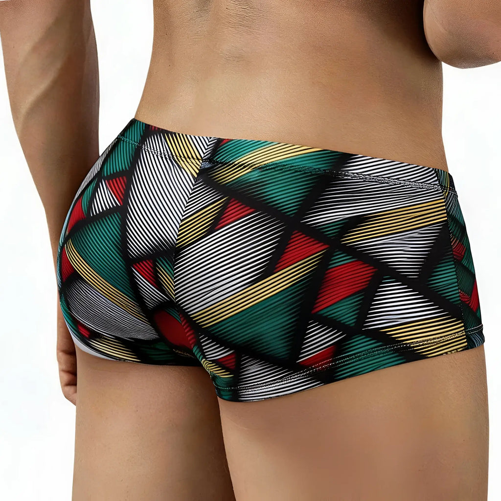 MetroMaleWear Cebada Trunk 2125-50 vibrant geometric patterned swim trunks in green red yellow and black with bold stripes