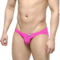 Bright pink form-fitting mens briefs with sleek smooth fabric and a small white metro malewear tag at the waistband