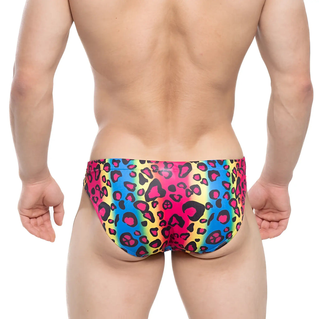 Vibrant rainbow-colored metroMalewear character bikini 5103-M06 swim trunks with bold leopard print in pink blue and yellow