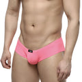 Bright pink form-fitting mens briefs by Metromalewear with sleek smooth fabric and black logo waistband
