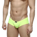 Bright neon green briefs by metromalewear featuring a black logo tag at the waistband for bold comfort