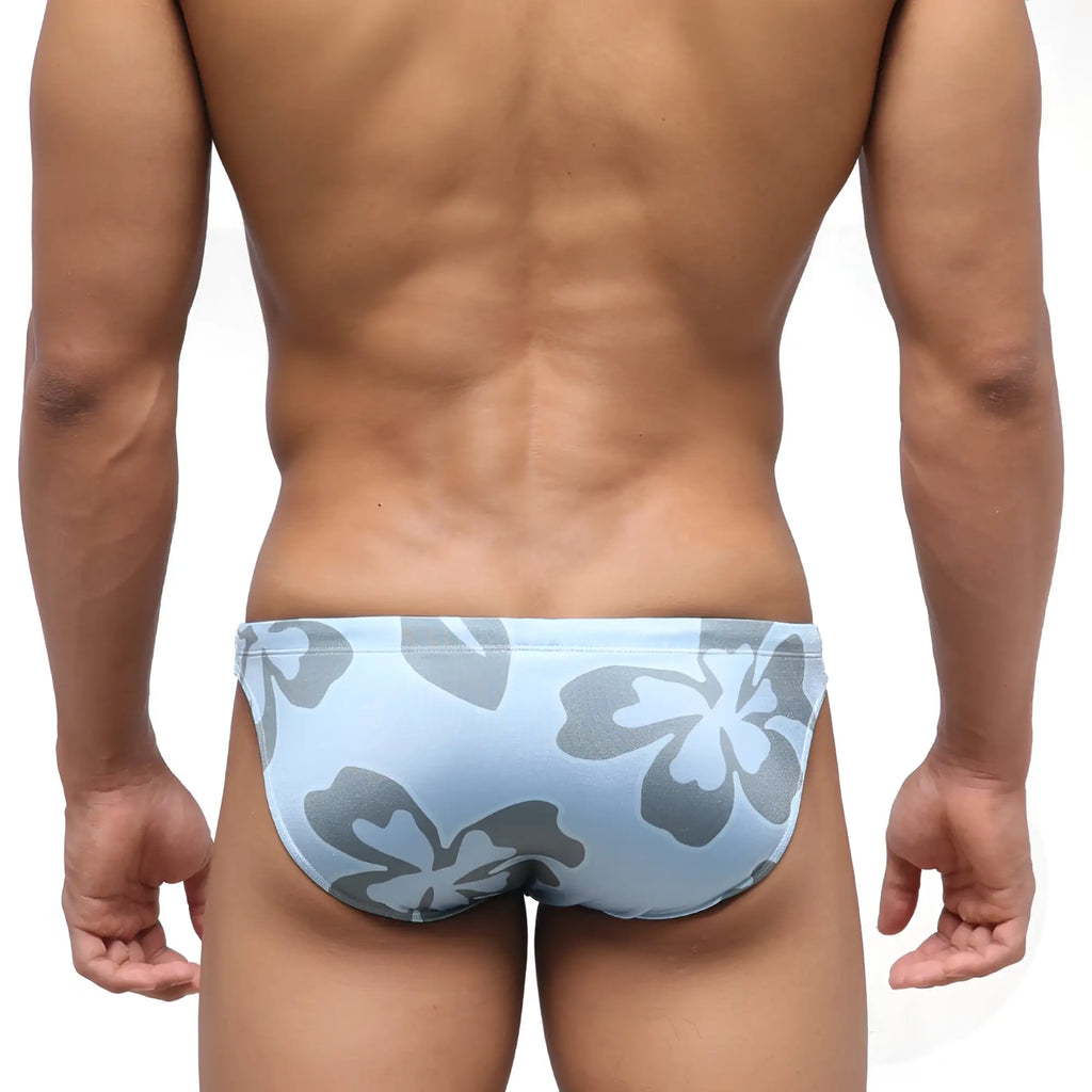 Light blue MetroMaleWear classic swim bikini featuring bold gray hibiscus flower pattern for beachwear