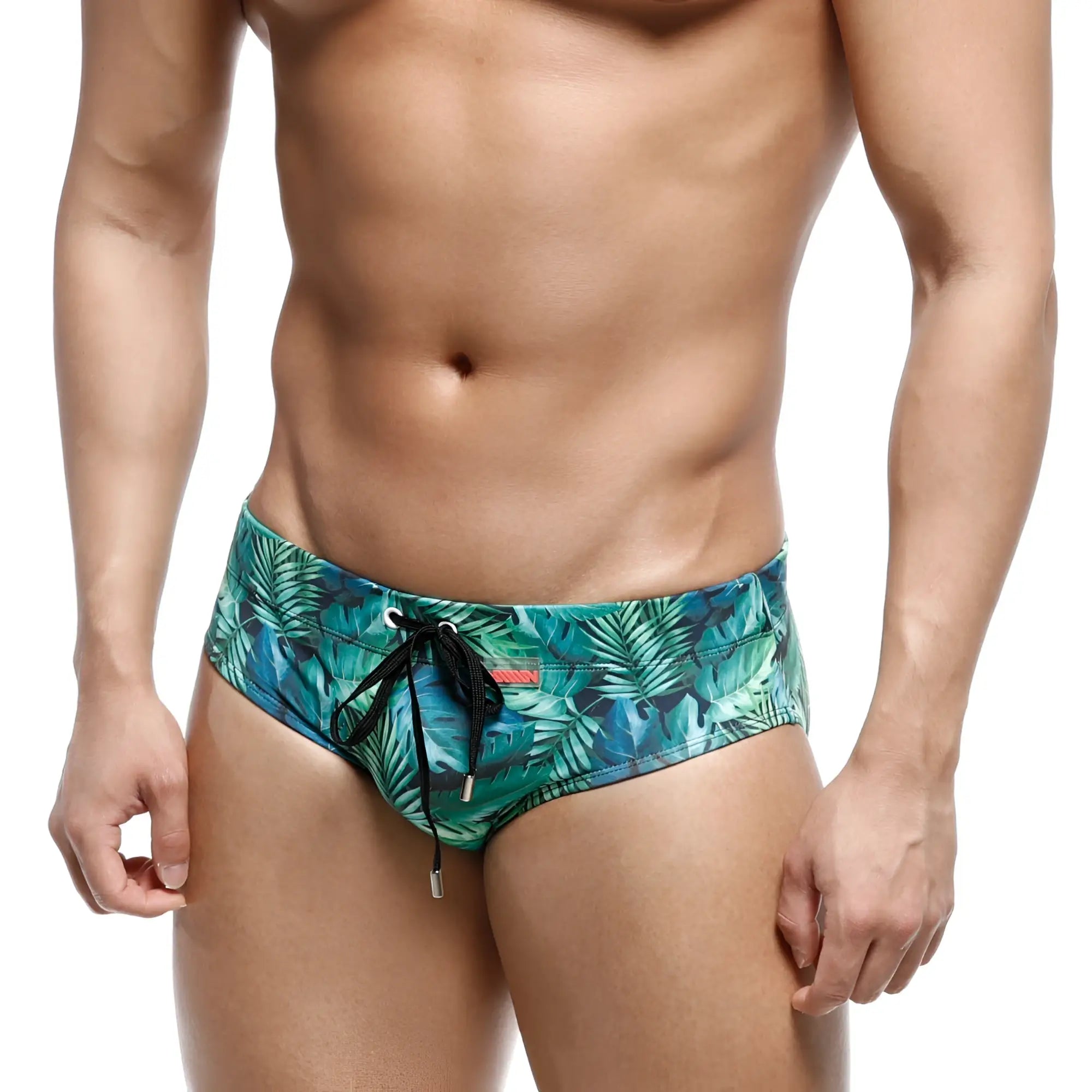 Men’s MetroMaleWear Classic Swim brief jungle 4914-08 with vibrant teal and green tropical leaf pattern and black drawstrings