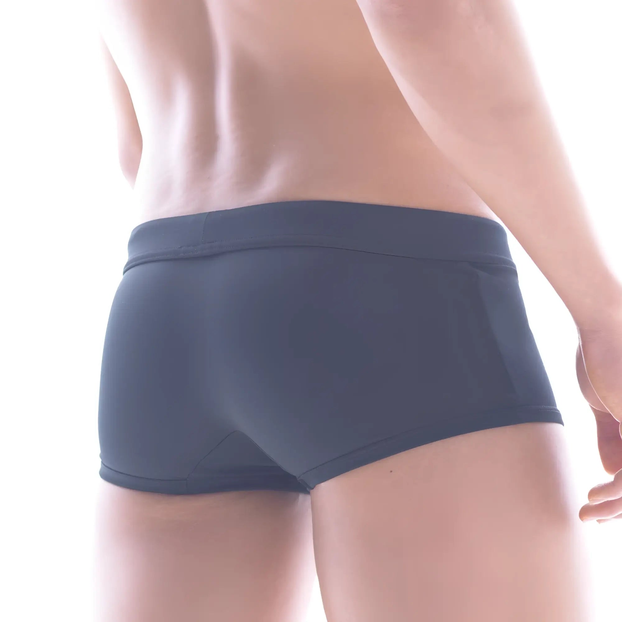 Dark gray form-fitting briefs with smooth stretchy fabric and snug waistband metro male wear classic swim trunk black
