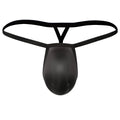 Black thong-style cock bra thong by metromalewear with smooth textured fabric and thin elastic straps