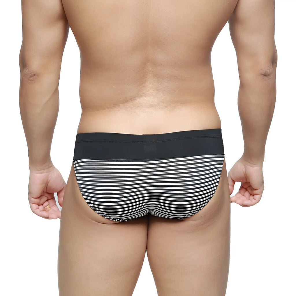 MetroMaleWear Colina bikini briefs with black and white stripes and a solid black waistband for comfortable wear