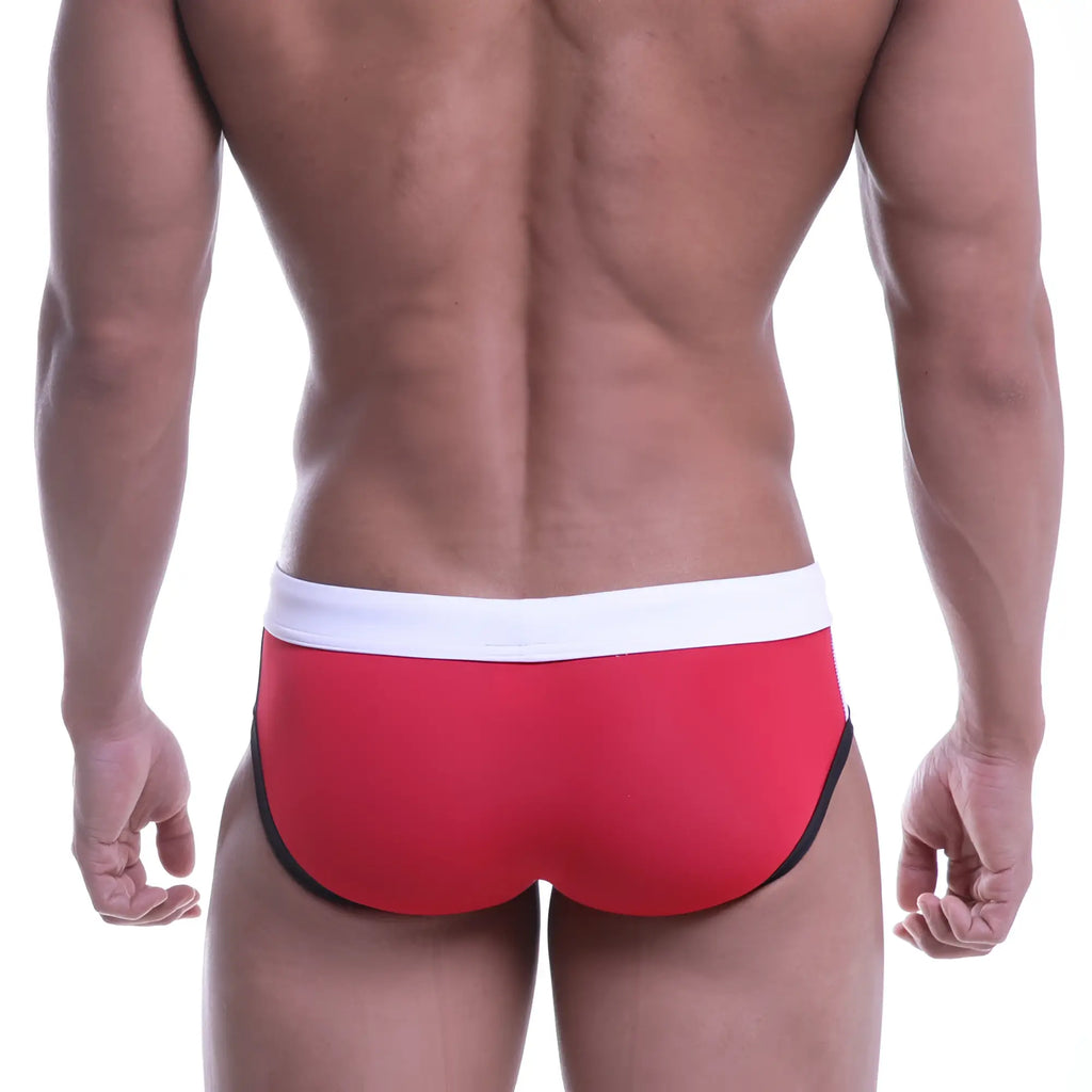 Red swim trunks with white waistband and black trim from metro male wear colors swim brief white 4976-00 collection