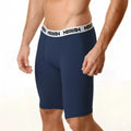 Navy blue cotton athletic briefs with 15 inch long legs and white elastic waistband featuring black metro male wear logo