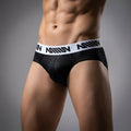 Black men’s briefs with white elastic waistband featuring ammun logo from metromalewear crocodile hip brief 5003-85