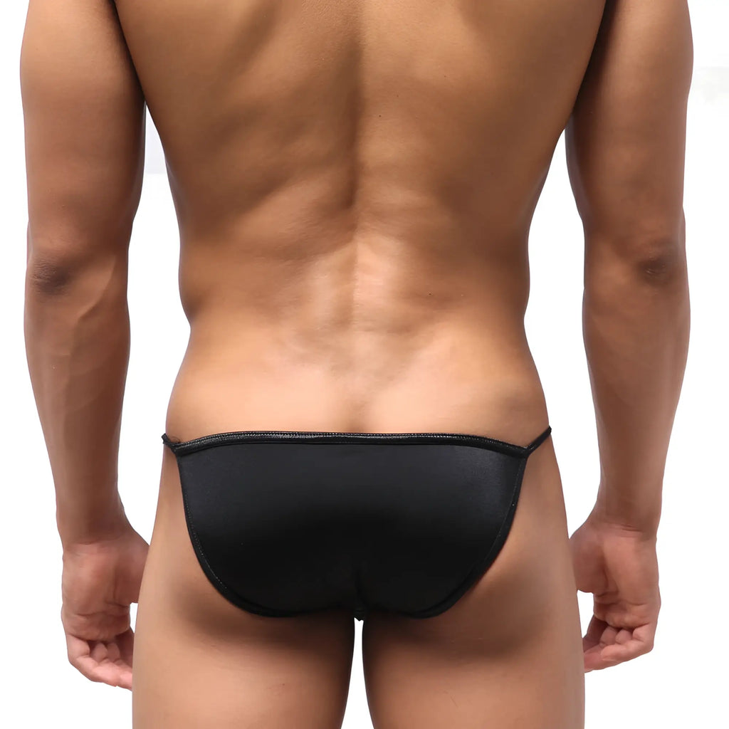 Black sleek form-fitting swim trunks with smooth fabric finish from metromalewear dangerous swim bikini 4930-20