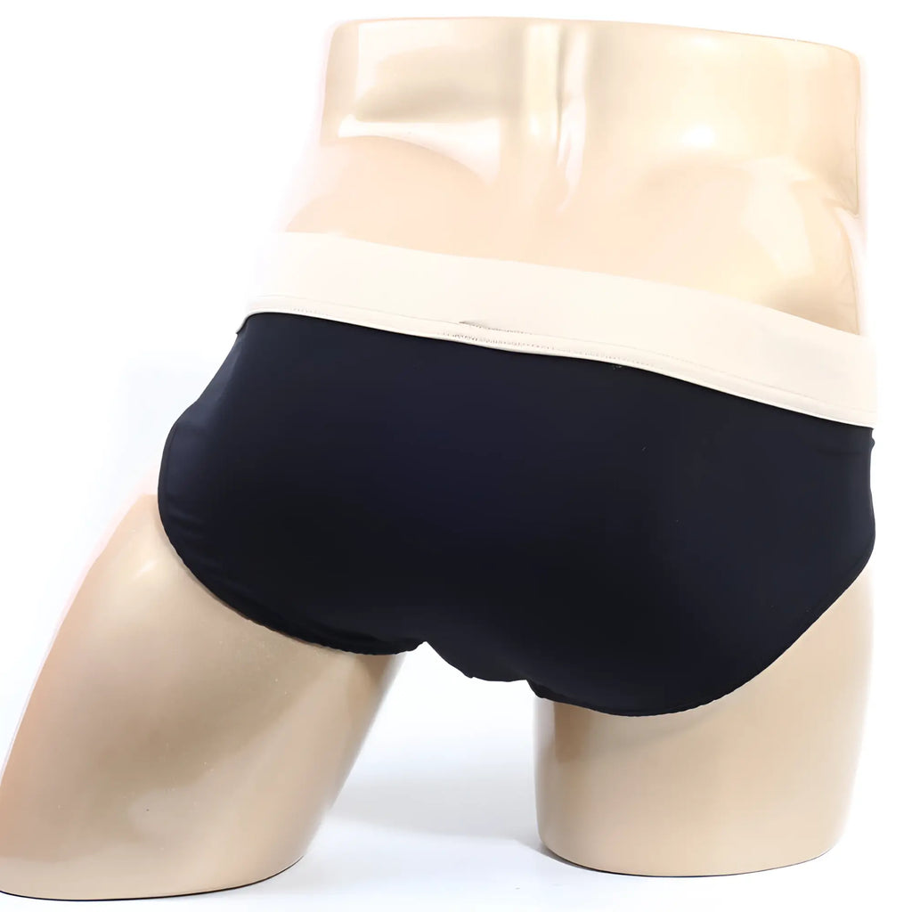 Black MetroMaleWear deportivo brief with contrasting cream waistband designed for comfort and athletic use
