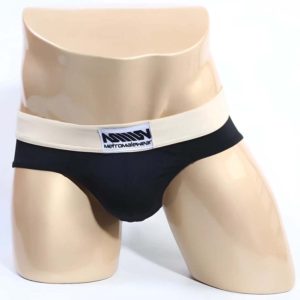 Black MetroMaleWear deportivo brief with cream waistband featuring midn metromalewear logo for active comfort