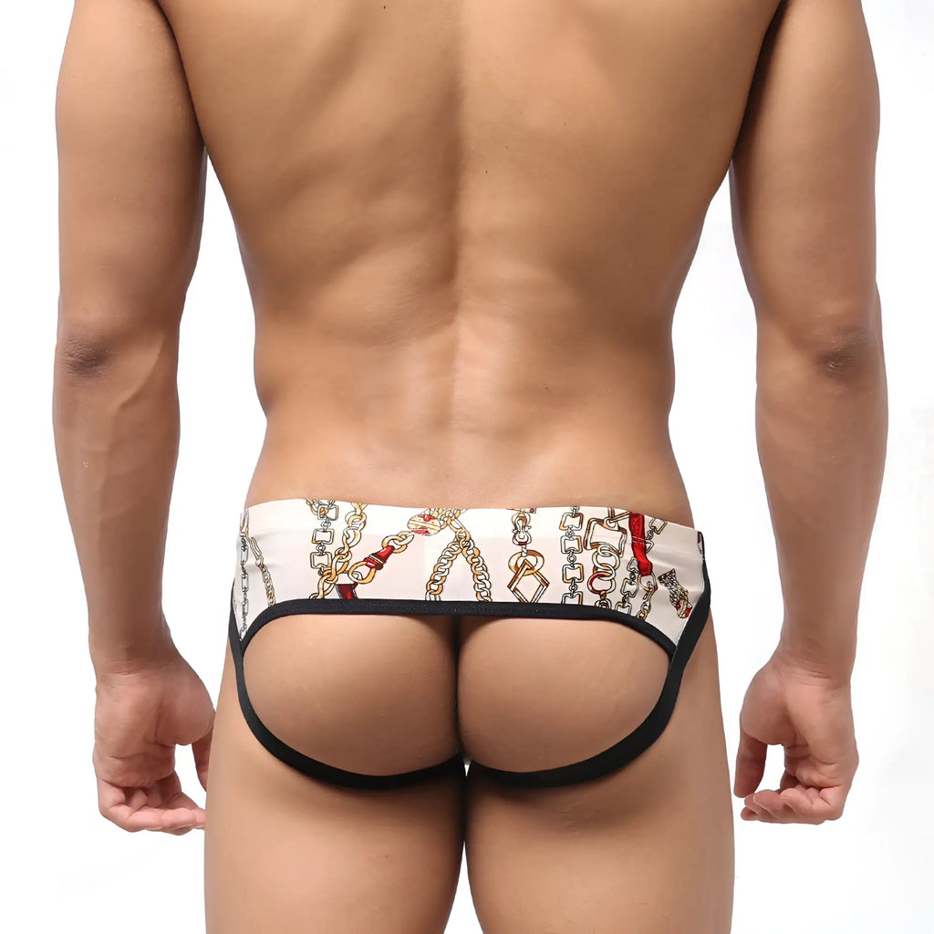 White briefs with a chain and red accent pattern and black trim from metromalewear despejado jock strap lujos 1301-31