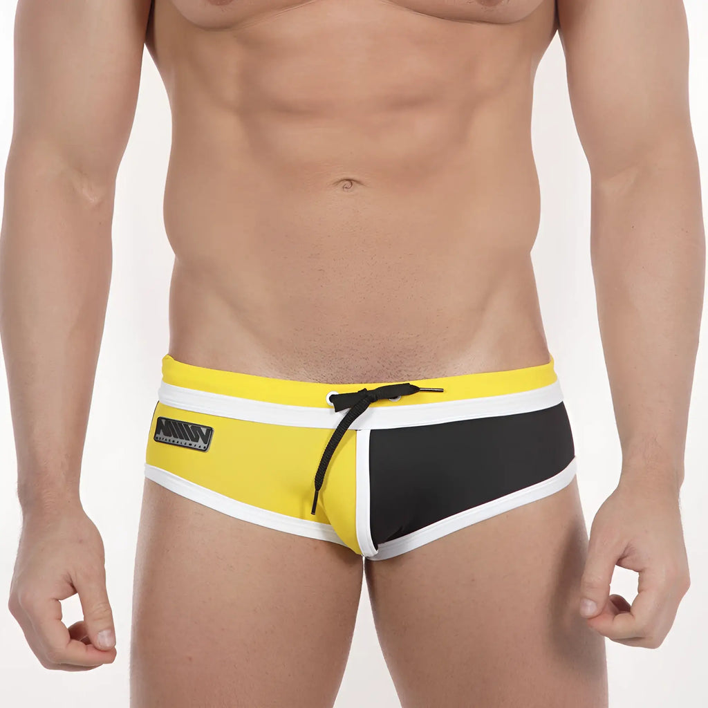 Bright yellow and black MetroMaleWear double band swim trunks with white trim and branded logo on the side