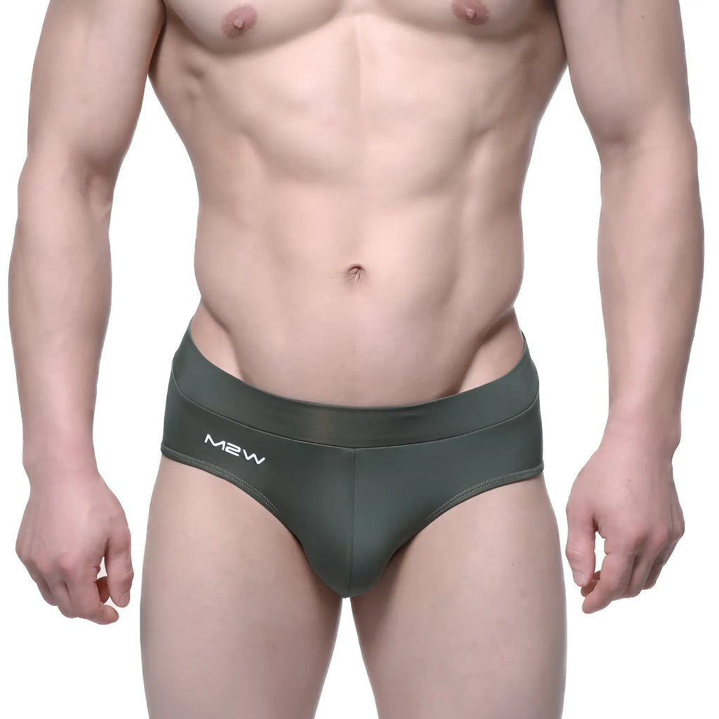 Dark olive green metro male wear espacio brief with sleek form fitting design and subtle white m2w logo on waistband
