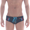MetroMaleWear Europa swim brief black with vibrant blue and red side stripes and a matching light blue drawstring bow