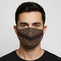 Brown metroMalewear face mask with gold-tone metallic studs in geometric pattern and matching trim