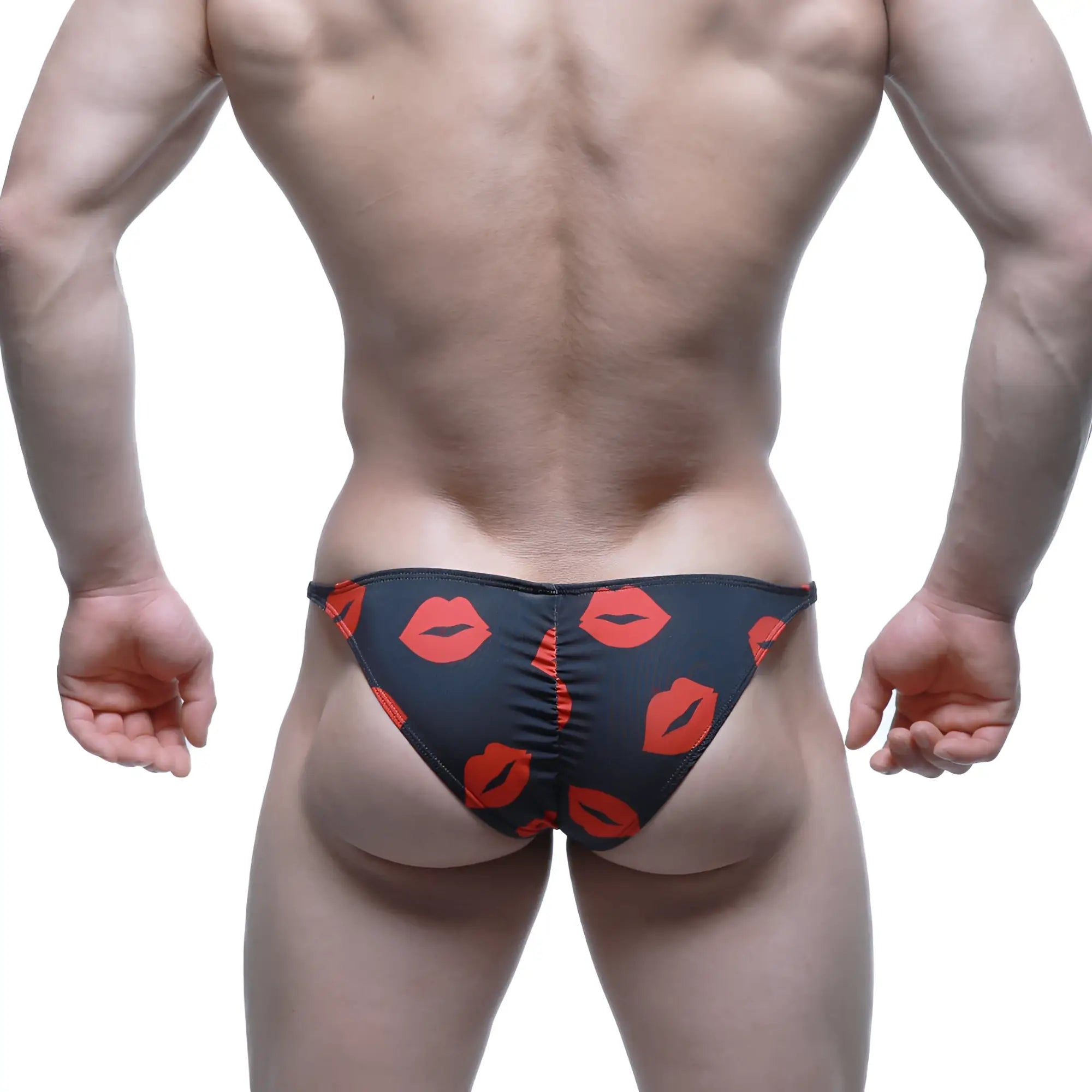 Black swim trunks with bold red lipstick prints from MetroMaleWear fantasy bikini kiss 6116-62 product line
