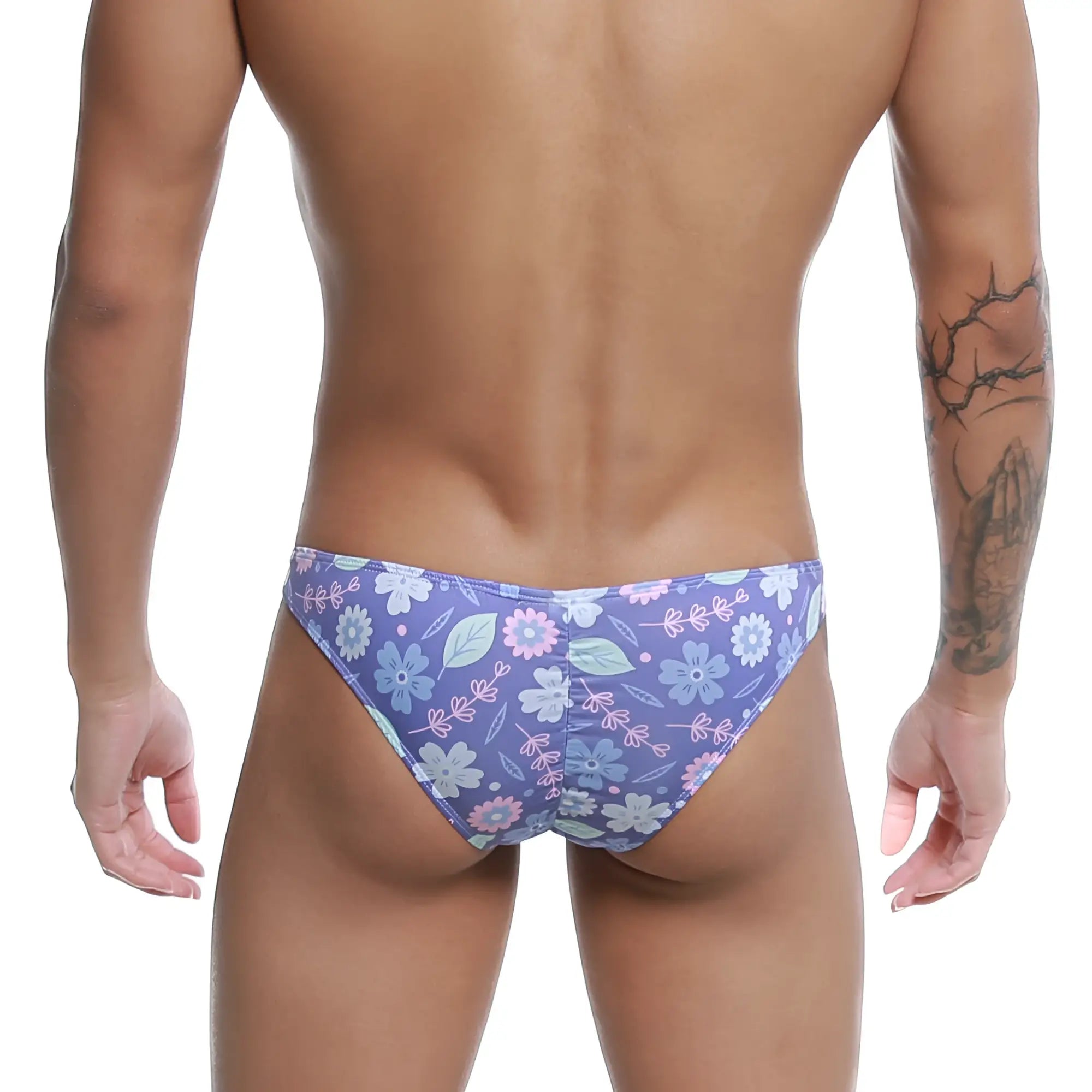Purple floral-patterned men’s briefs with light blue pink and white flowers by metromalewear fits bikini jardin 6603-44