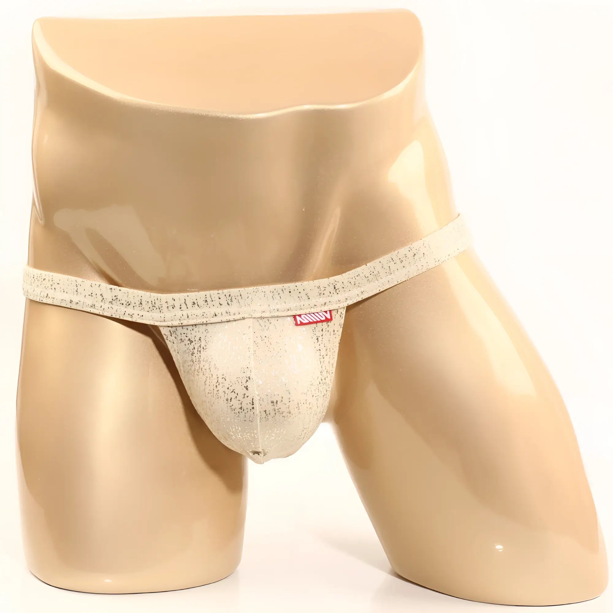 Cream-colored lace thong with subtle texture and red MetroMaleWear brand tag metroMalewear Gloria Thong 4002-52