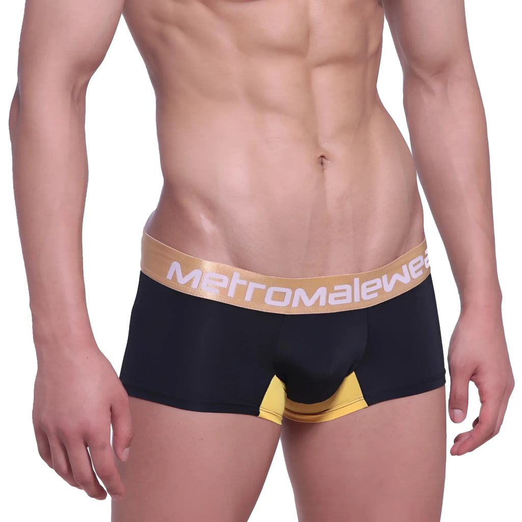 Black men’s briefs with gold waistband metromalewear logo and yellow leg accents metroMalewear goldmine short boxer