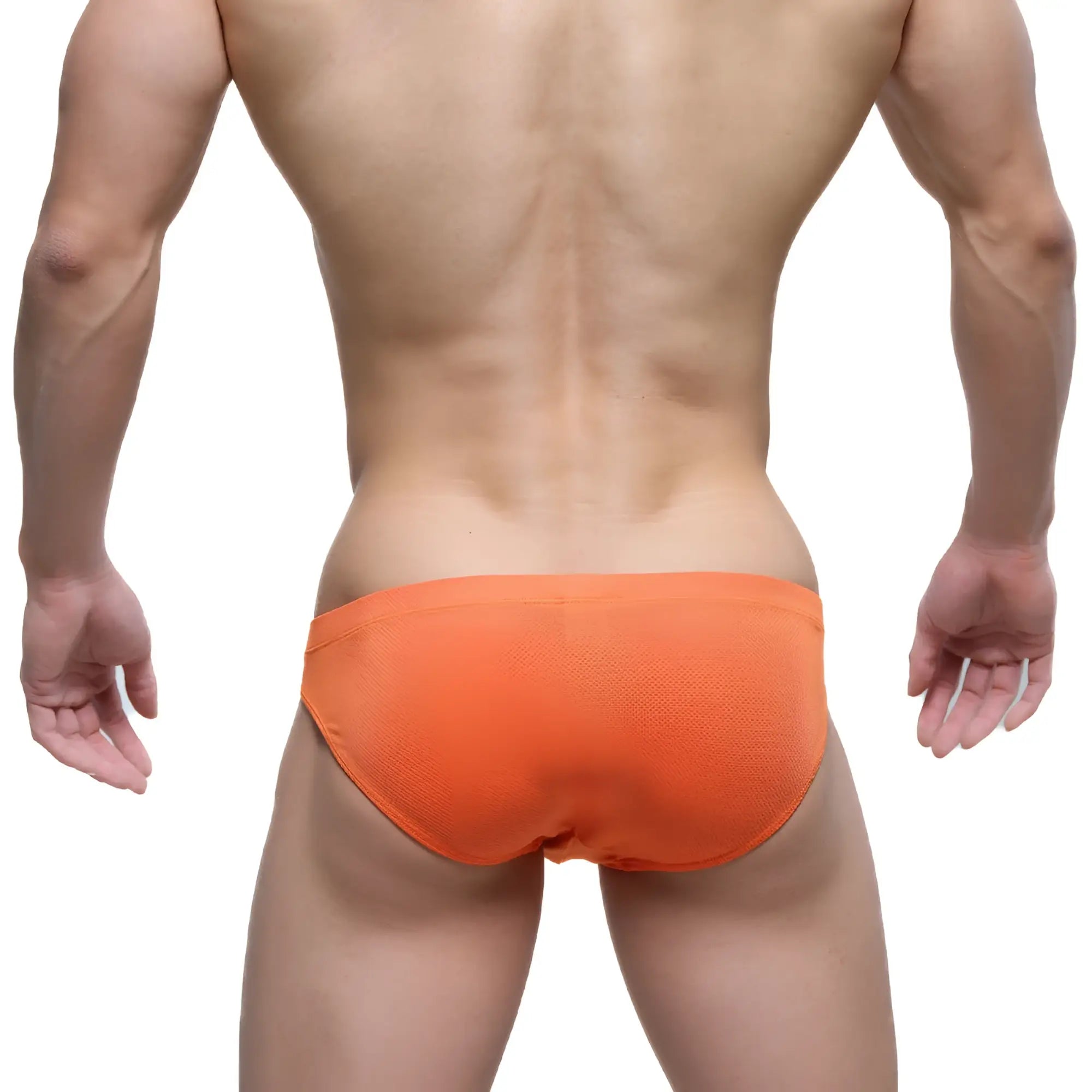 Bright orange textured swim trunks by metromalewear ideal for halloween beachwear and swim activities