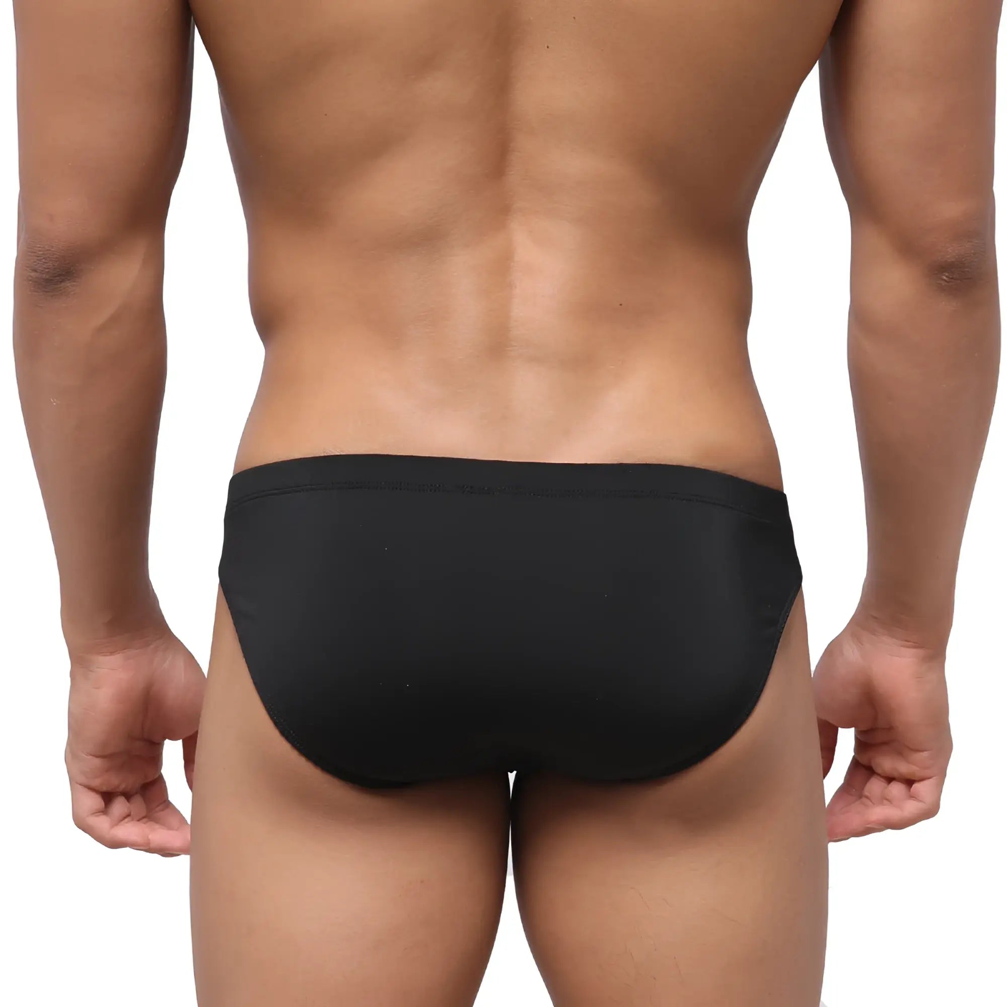 Black metroMalewear highcut hip brief swim trunks with smooth form-fitting fabric and subtle waistband detail
