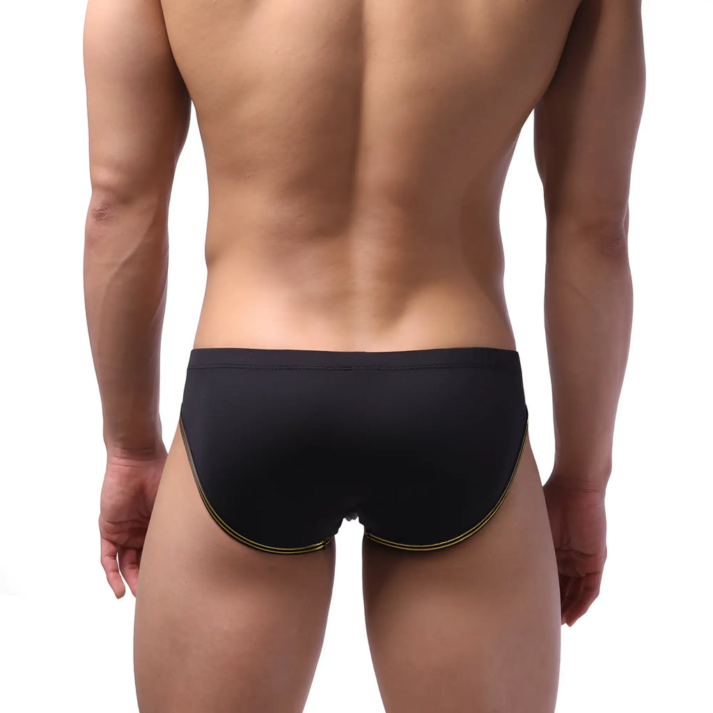 MetroMaleWear highcut hip brief black swim trunks with gold trim along leg openings for stylish beachwear