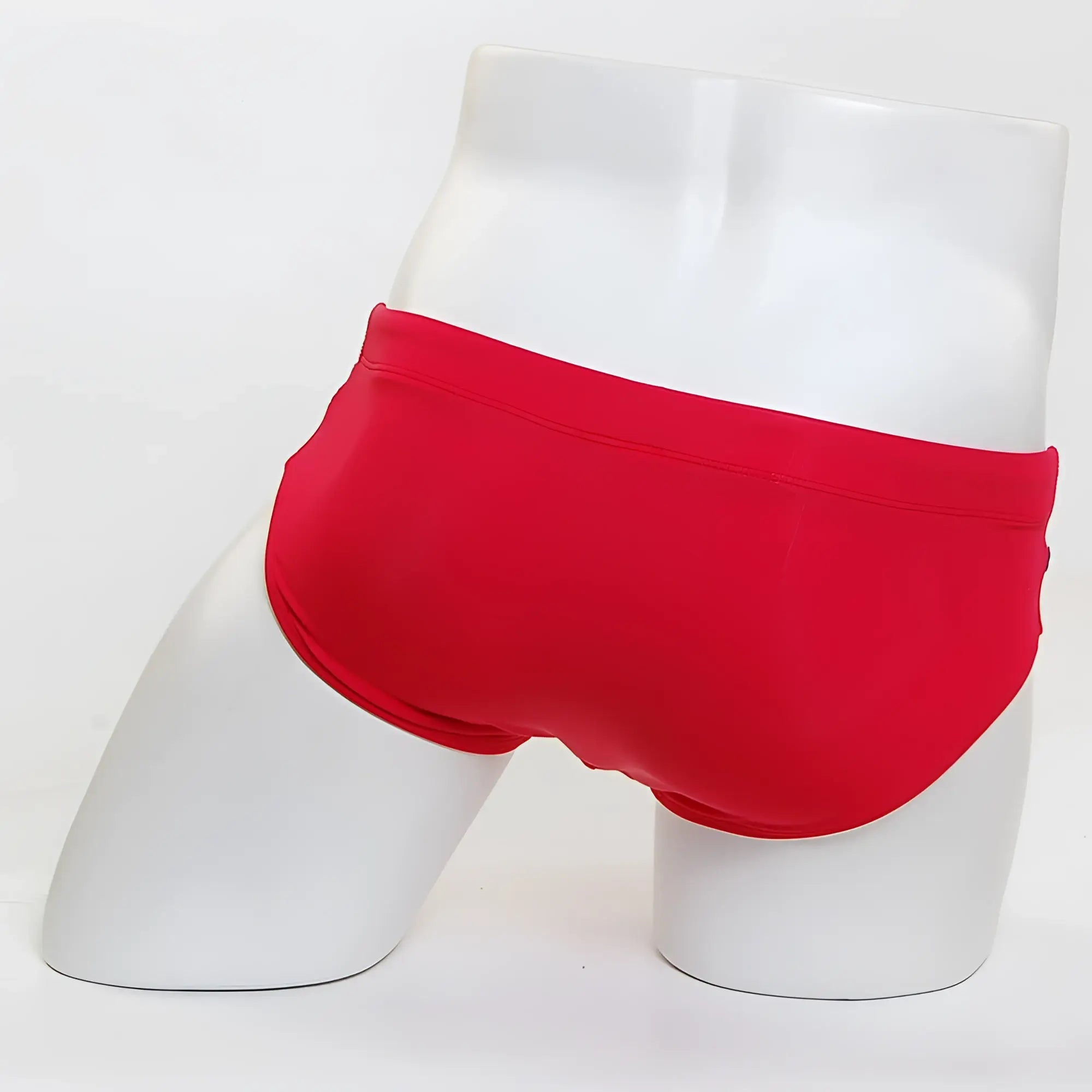 Bright red metroMaleWear Ibiza swim brief 4928-12 displayed on a mannequin showcasing its vibrant color and fit