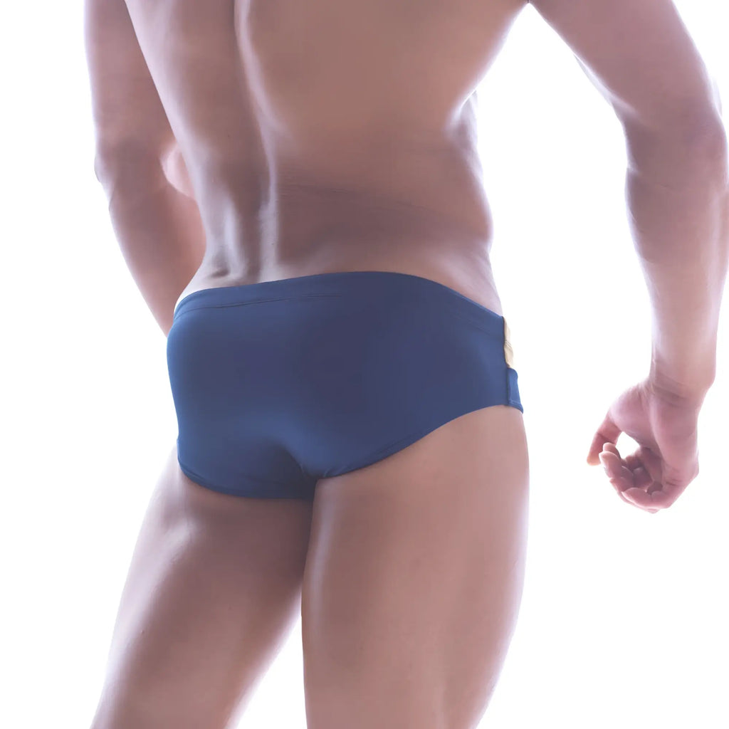Navy blue MetroMaleWear Ibiza swim brief with gold metallic accent on side seam for stylish beachwear