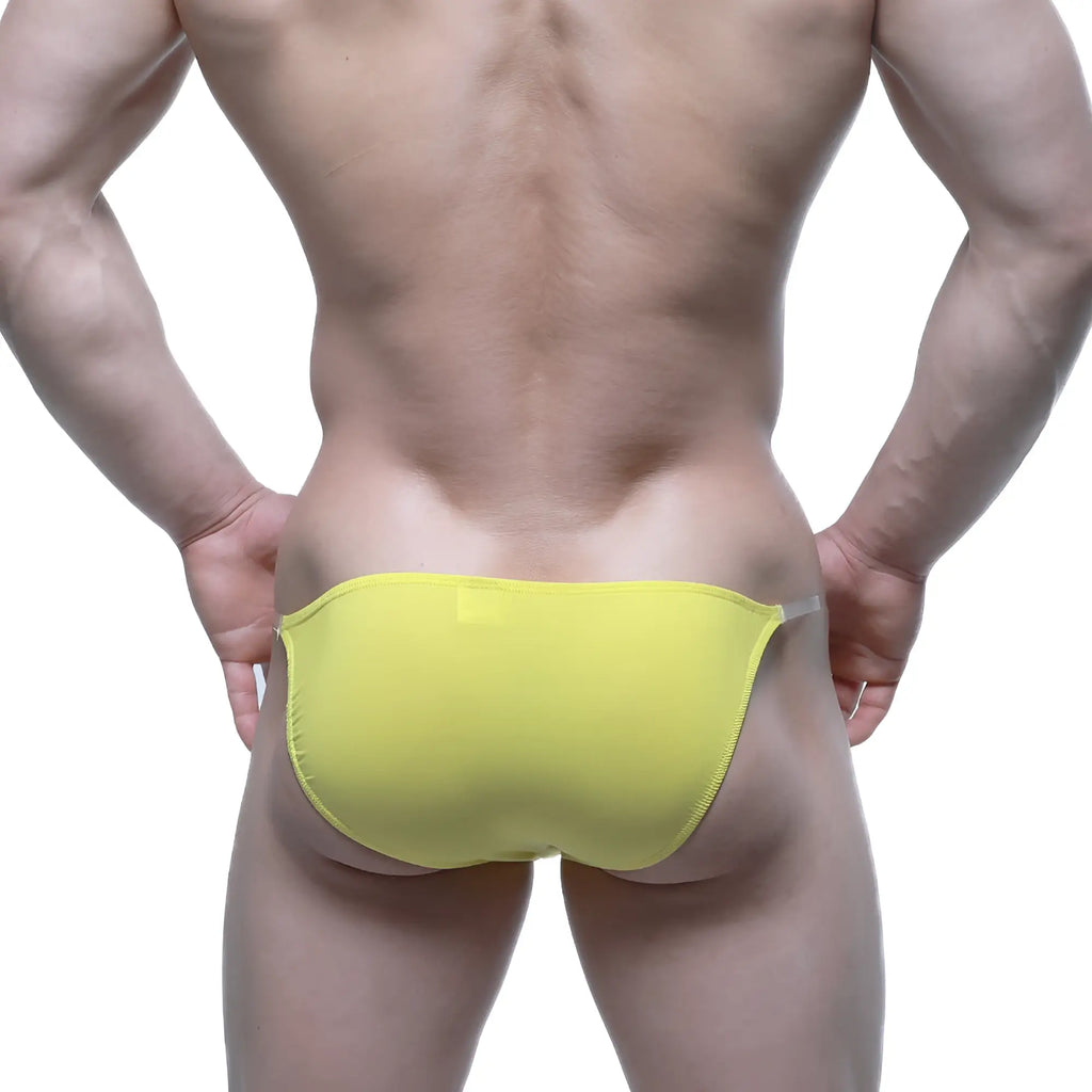 Bright yellow form-fitting swim trunks with a sleek minimalist design from MetroMaleWear Invisible Bikini 3704-15