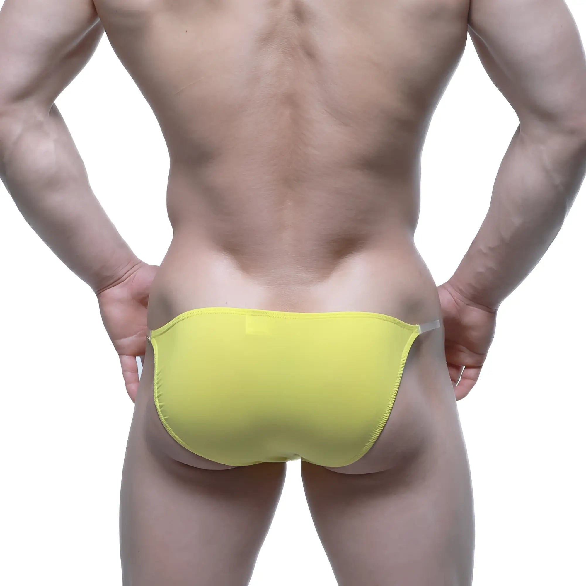 Bright yellow form-fitting swim trunks with a sleek minimalist design from MetroMaleWear Invisible Bikini 3704-15