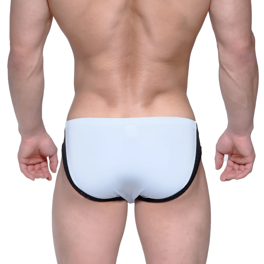 Light blue metroMalewear lobo hip brief swim trunks with black trim designed for a comfortable fit