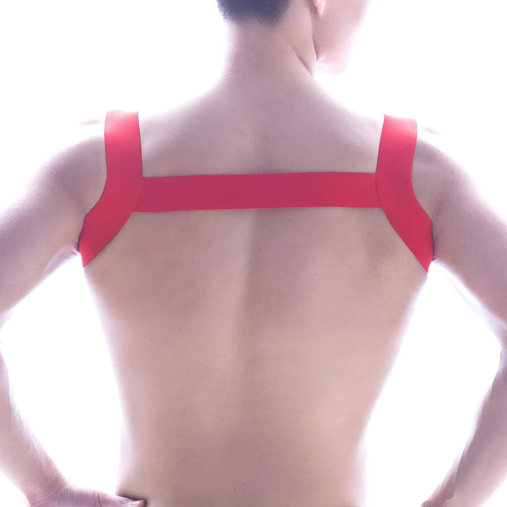 Back view of metro malewear logo harness red adhesive tape in an x-shaped pattern for stylish wear