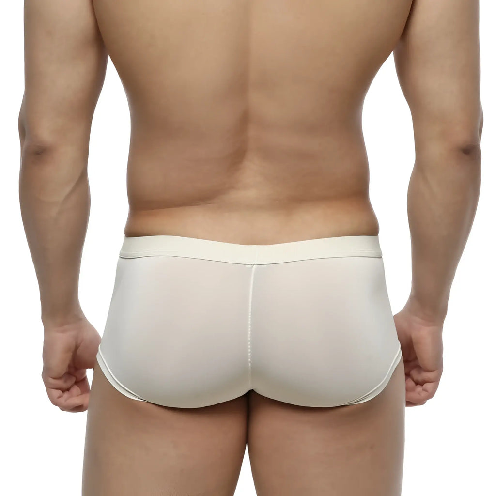 Cream-colored metroMaleWear Lupin trunk briefs with smooth seamless fabric and a narrow waistband for comfortable fit