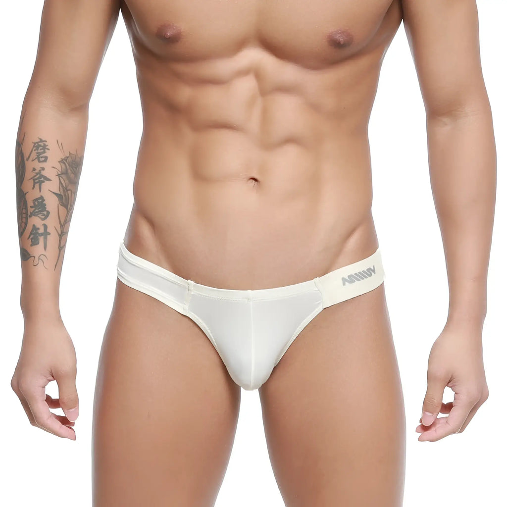 White arrow brand metro malewear malon bikini briefs in nude with sleek form fitting design and subtle elastic waistband