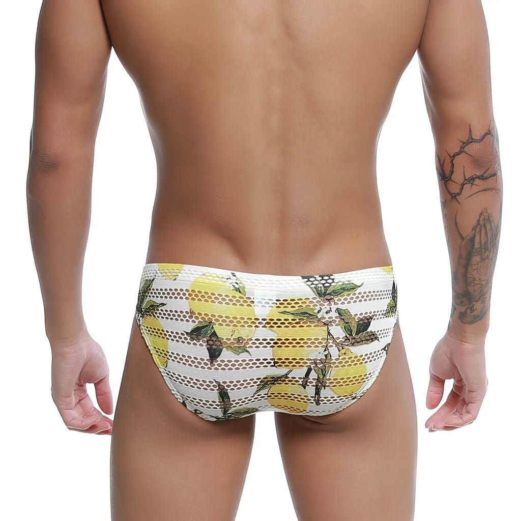 White mesh swim trunks with vibrant yellow lemon and green leaf pattern metro male wear mango bikini 5103-36