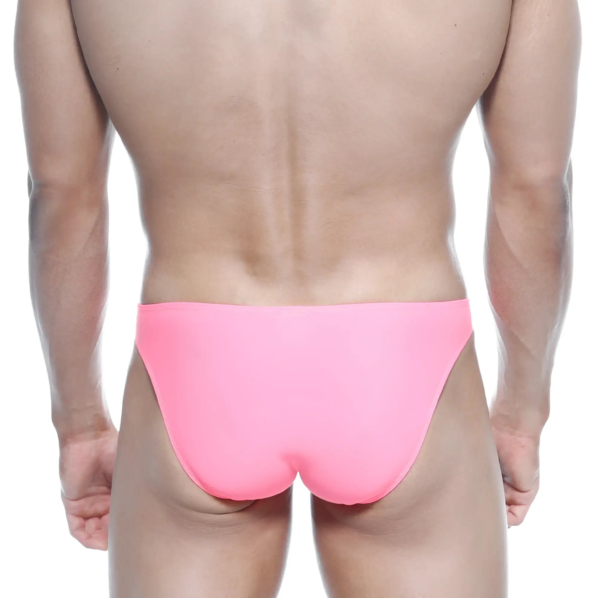 Bright pink sleek form-fitting swim trunks from metromalewear max bulge bikini fuchsia 6007-02