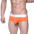 Bright orange MetroMaleWear Max Contour athletic briefs with white makromat elastic waistband for active wear