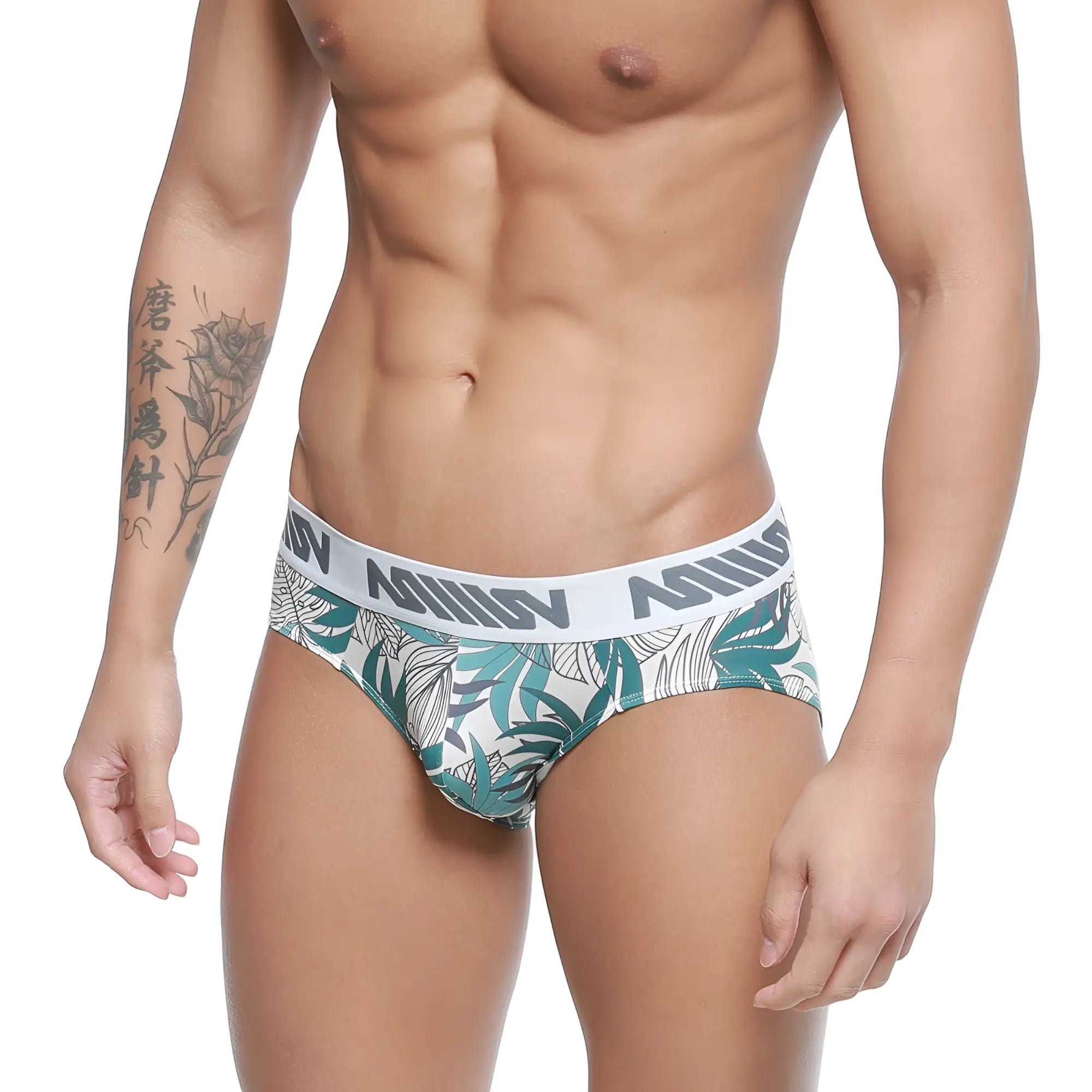 White briefs with tropical green and gray leaf pattern and anis branded elastic waistband by MetroMaleWear