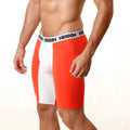 Bright orange and white MetroMaleWear mesh athletic briefs with a bold vertical stripe and branded waistband