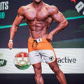 MetroMaleWear MetroMuscleWear Cordoba physique board short orange and white with black drawstring and shield logo on side
