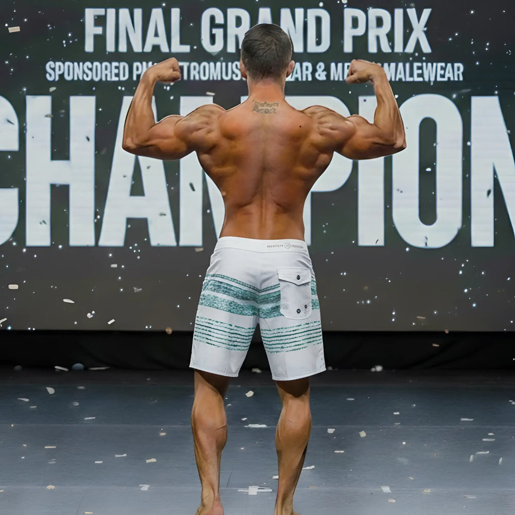 White board shorts with teal horizontal stripes and a front pocket from MetroMaleWear MetroMuscleWear Innocent Physique