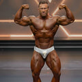 Silver mesh briefs with a small gold logo from MetroMaleWear MetroMuscleWear silver snake competition suit 4974-10