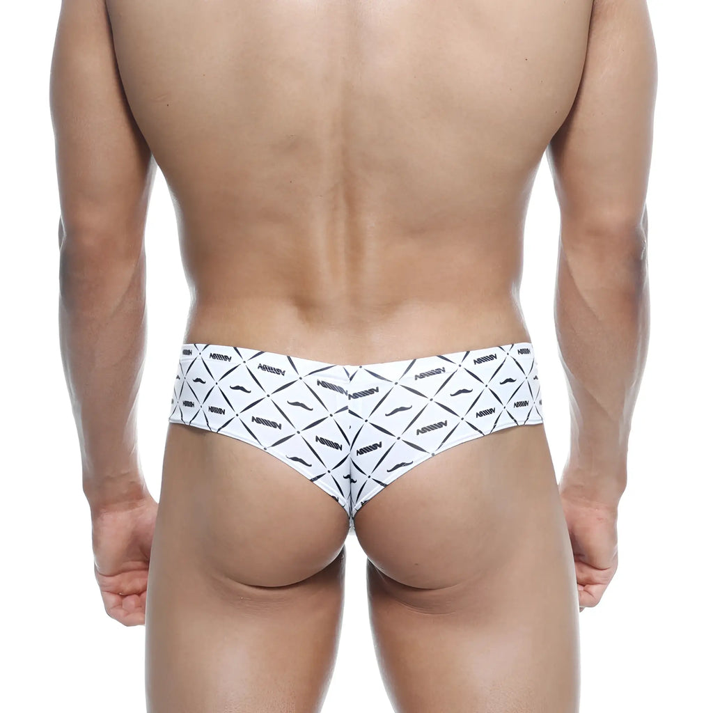 White briefs with bold black geometric mustache pattern and arrow brand name from metromalewear micro cheek caballero 2027-03