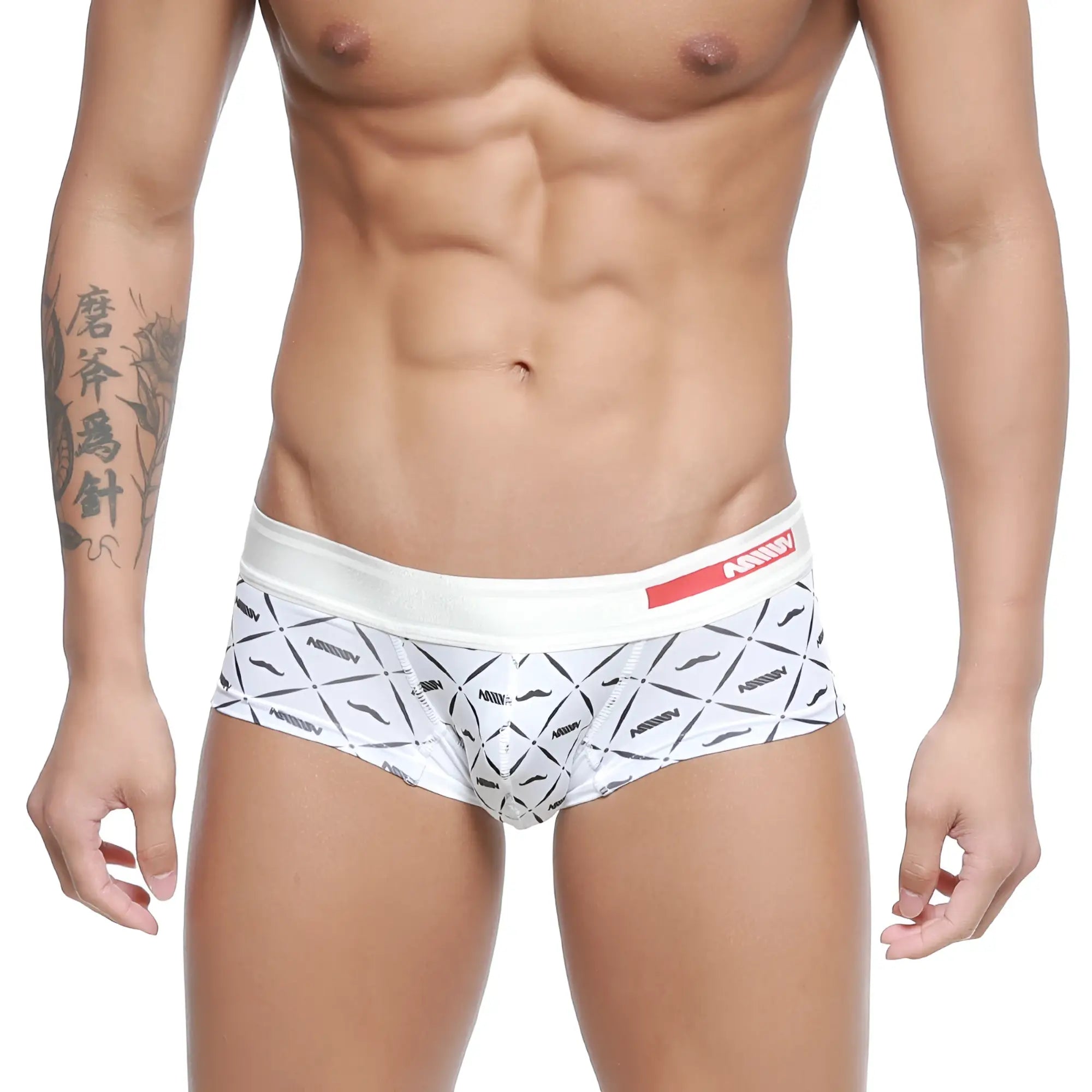 White briefs with black geometric mustache pattern and red arrow waistband from MetroMaleWear micro mini boxer caballero 7013-04