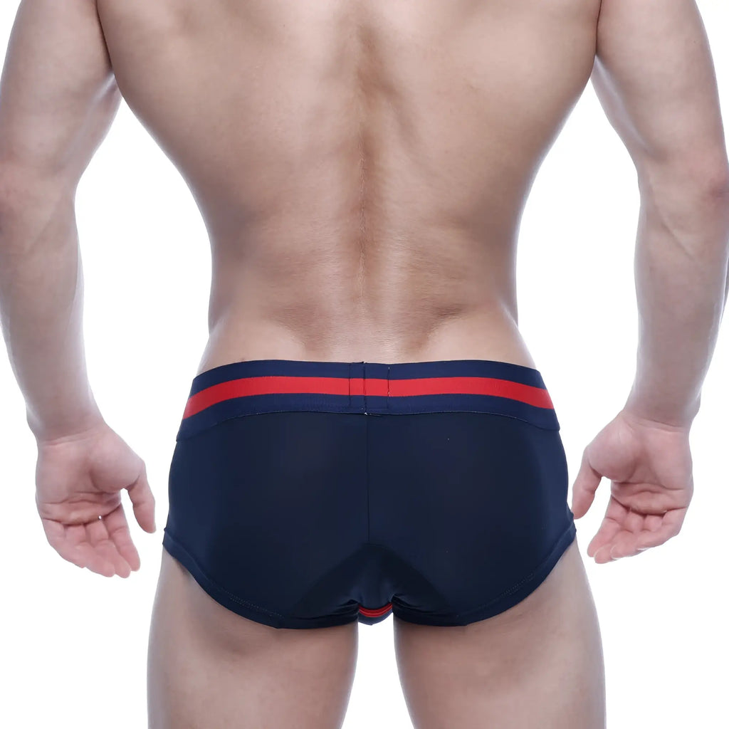 Navy blue MetroMaleWear Micro Mini Boxer swim trunks with red and navy striped waistband for comfortable fit