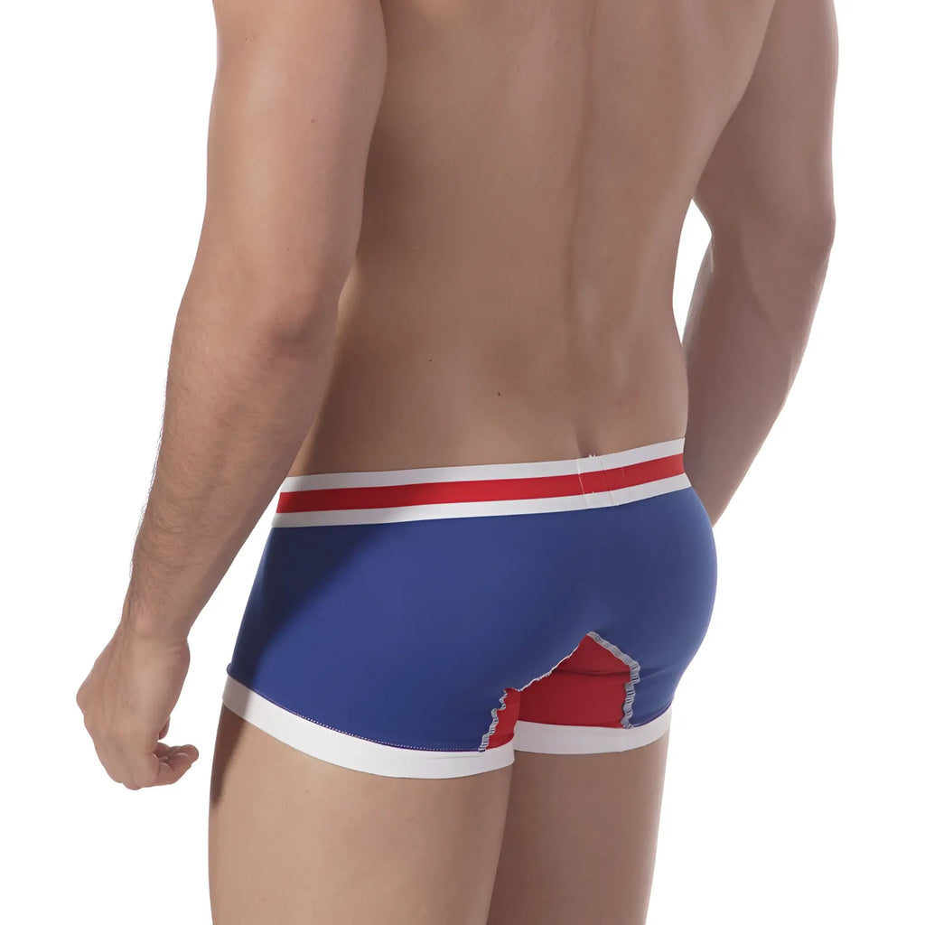 Blue men’s boxer briefs with red and white trim showing bold graphic design on the back by MetroMaleWear