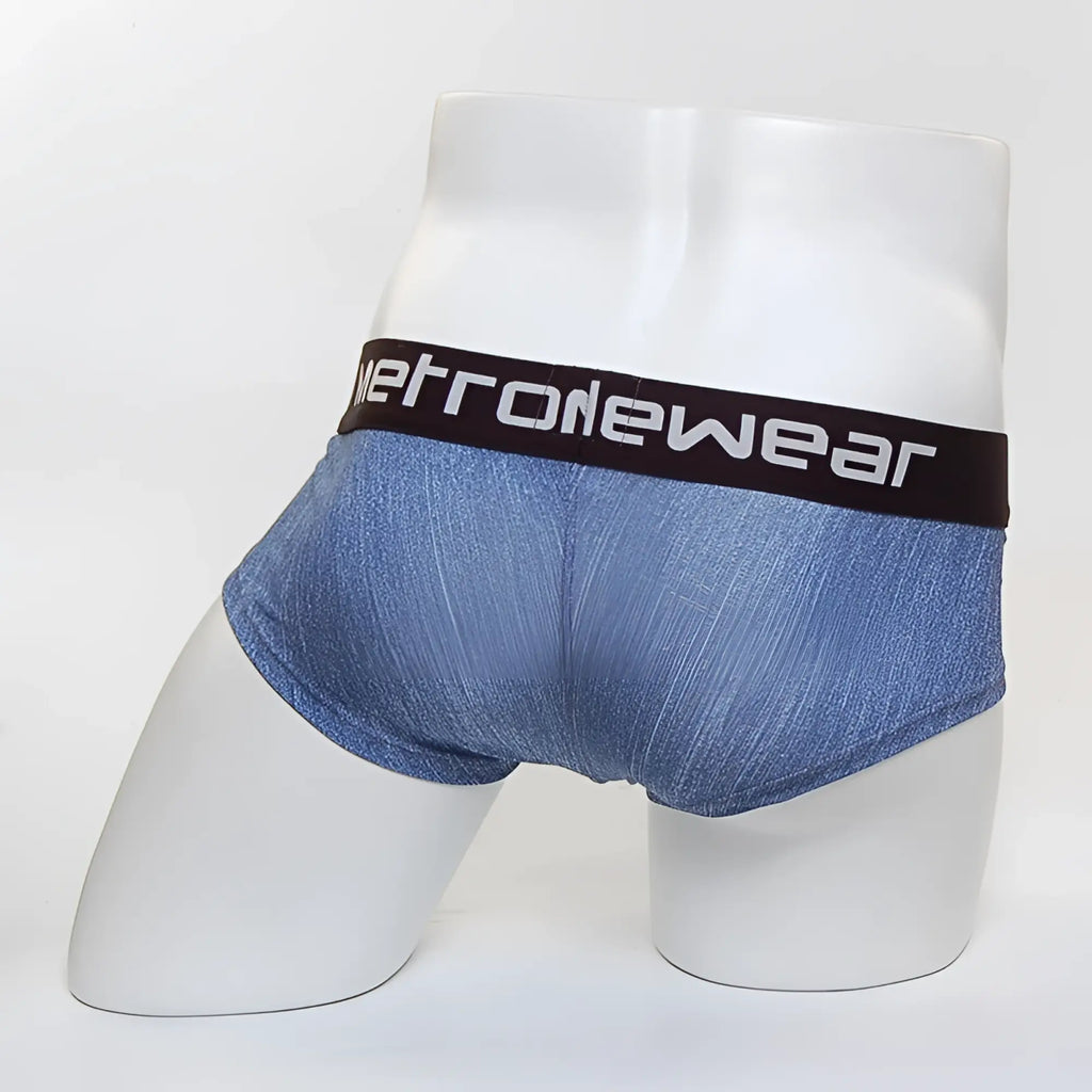 Blue denim textured men’s mini cheek boxer briefs with a black waistband featuring metrowear branding