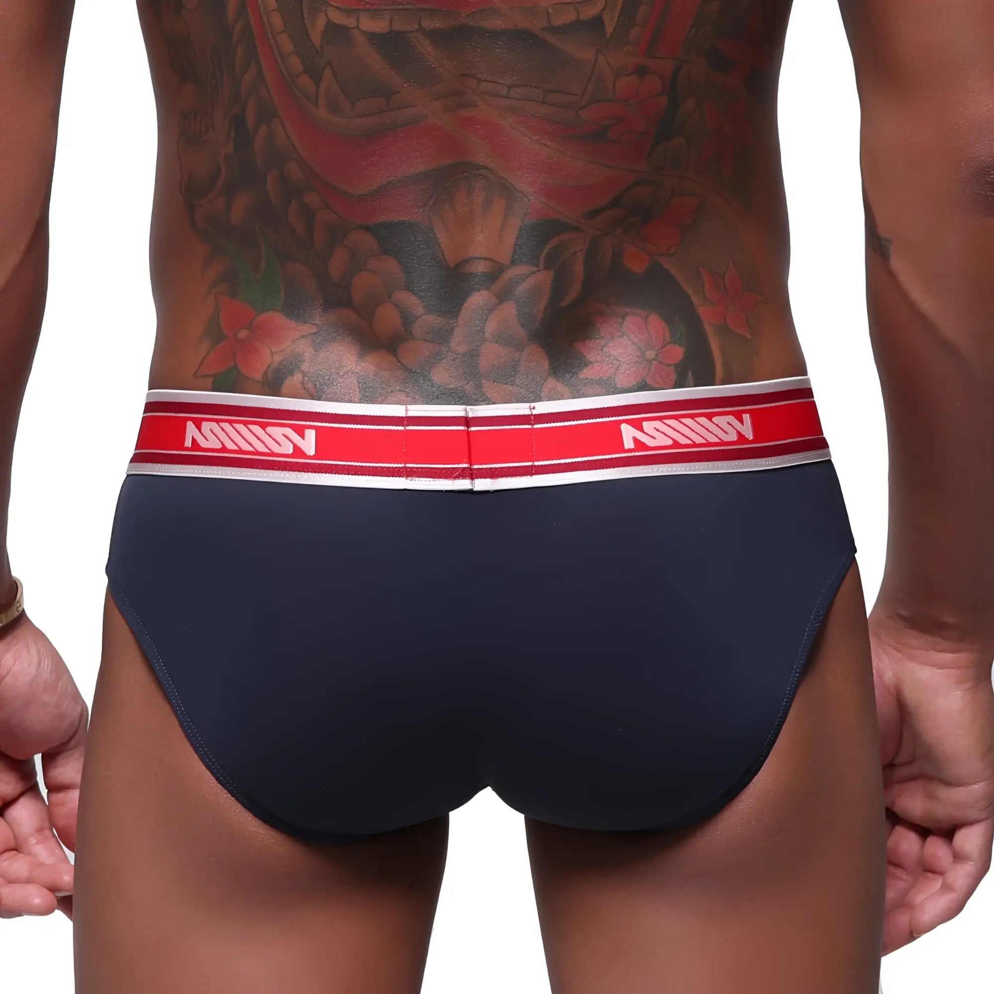 Metro male wear mirage bikini briefs in navy blue with red and white elastic waistband featuring avon branding
